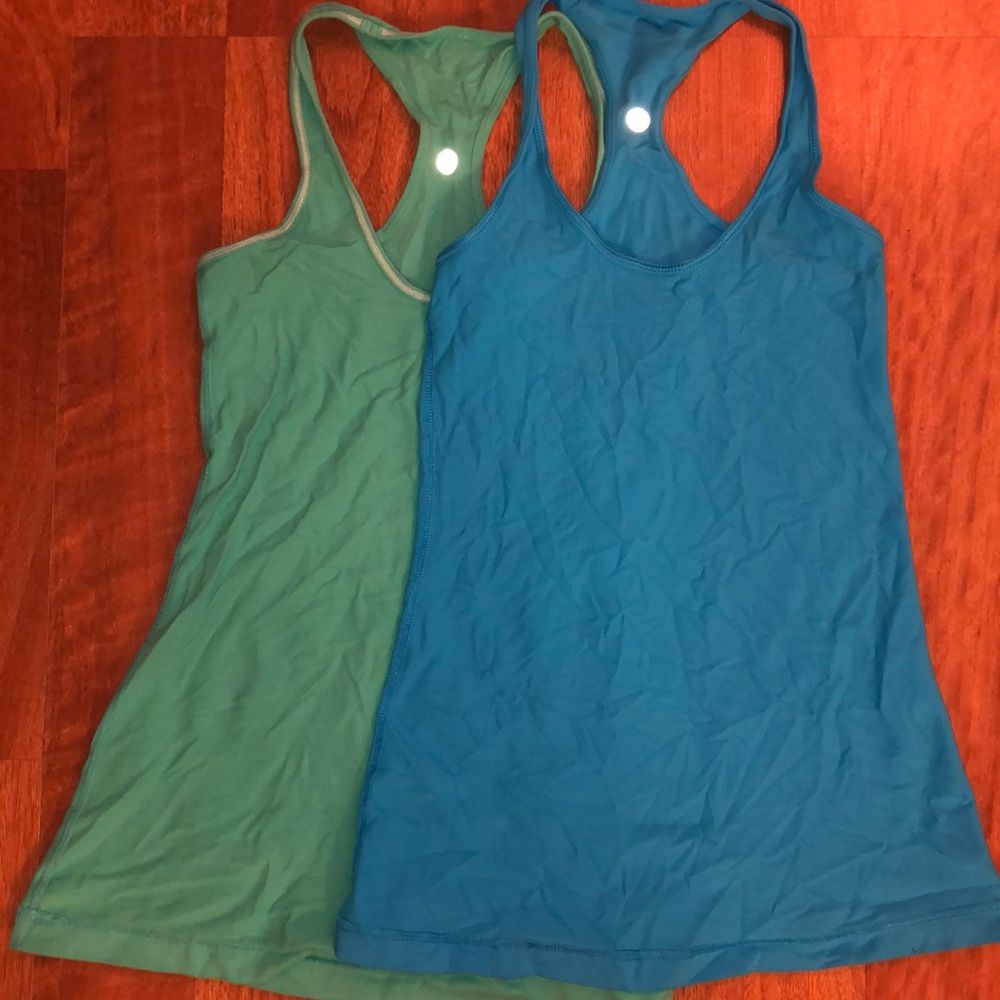 ONE SOLD. Teal is left